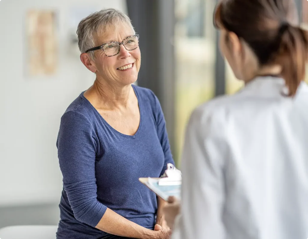 Image of physician and satisfied patient